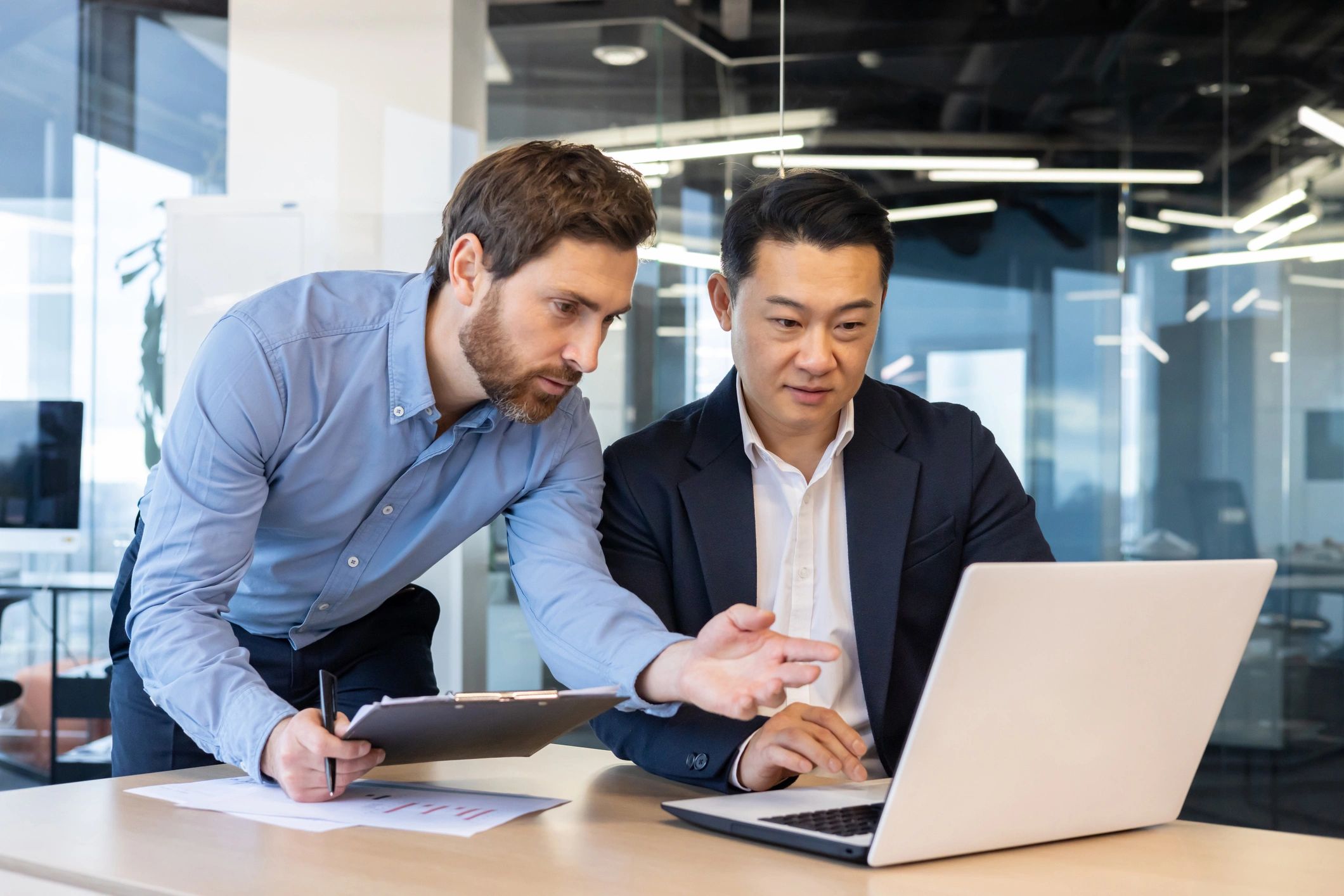 Business professionals reviewing IT strategies